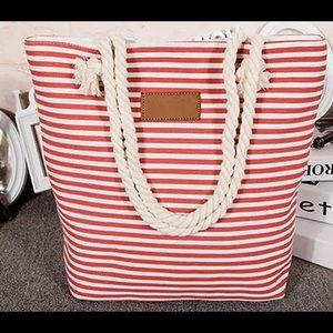 High-quality lined canvas tote with rope handles.